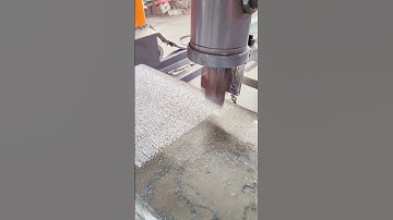Industrial Machine Creating Textured Finish on Stone Surface