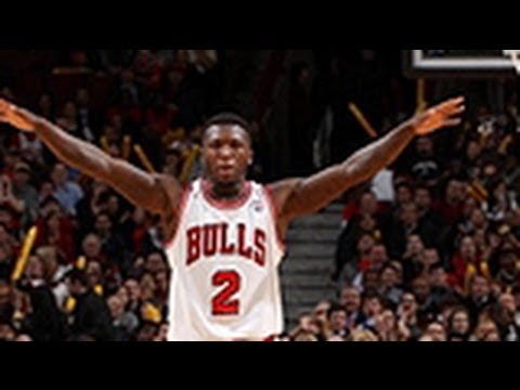 Check out this play from Bulls guard Nate Robinson as he splits the defense, goes through his legs & then elevates for the HUGE slam against the Blazers! Abo...