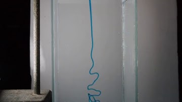 Instability of submerged (dyed) corn syrup jet in water