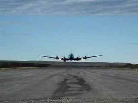 Buffalo Airways DC-4 in Stony Rapids Saskatchewan. Aircraft Comes right over our heads at the end of the runway