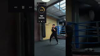 Shadow boxing workout with an app giving guidance.