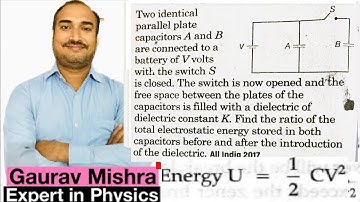 Two identical parallel platecapacitors A and B are connected to a Bbattery of V volts with switch S