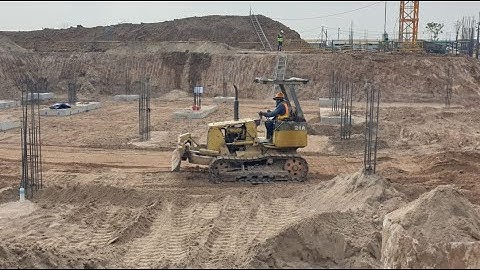 LEARN How a Bulldozer Transforms Construction Sites: Pushing Soil for Perfect Backfill!