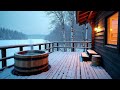 Snowy Sauna Deck by a Frozen Lake at Blue Hour