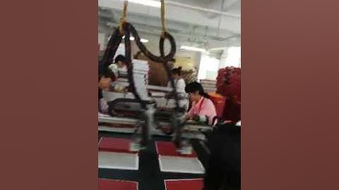 Automatic book-type box assembling machine