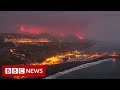 Toxic gas fears as lava from La Palma volcano reaches ocean - BBC News