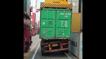 Crane lifting container along with truck #shorts #crane #lift #lifting #container #truck #vehicle