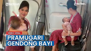 VIRAL Menangis Terus Menerus, Pramugari Gendong Bayi dalam Pesawat