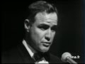 Marlon Brando charming in both French and English