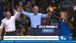 Trump and Obama rally supporters in battleground Michigan