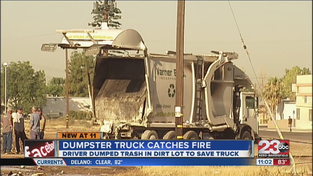 Garbage truck catches on fire while driving - YouTube