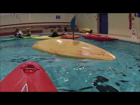 Kayak rolling in a pool with Tommy
