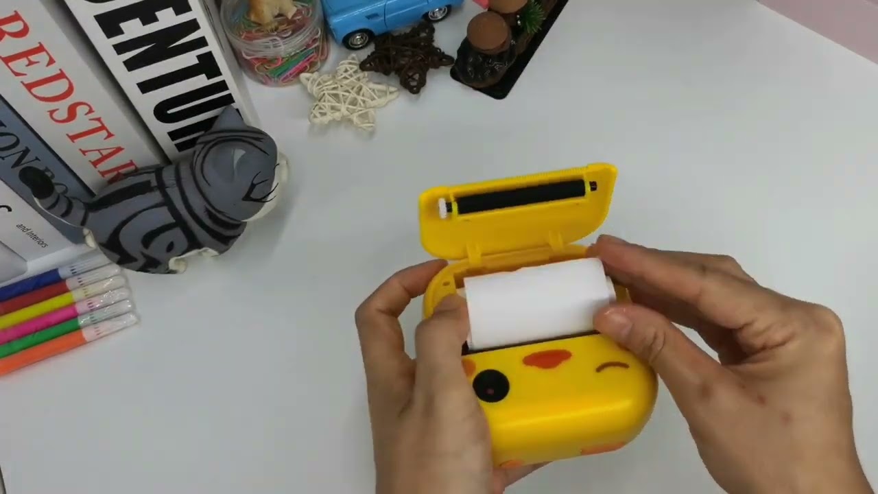 How do You Load Paper into A Kds Camera Printer?