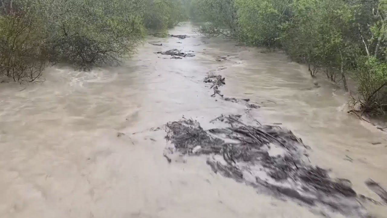 Atmospheric river floods California towns, brings rain, snow - YouTube
