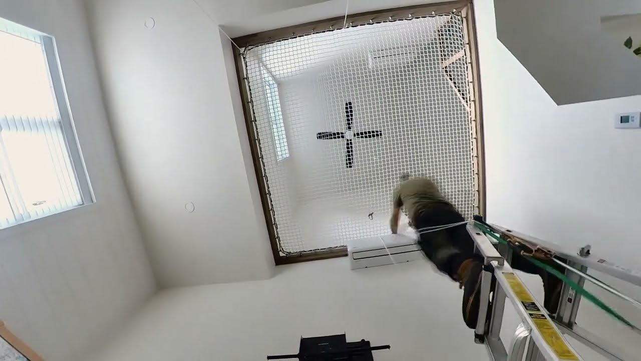 Installation filet d'habitation blanc chez David sur la rive sud de Montréal.