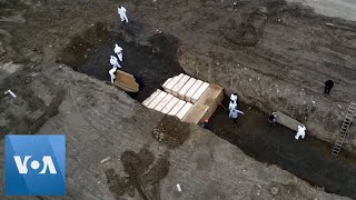 Bodies Buried in New York City Trench Increase Amid Coronavirus Pandemic CORONAVIRUS: As New York City deals with a mounting COVID-19 death toll and dwindling morgue space, the city has shortened the amount of time it will ..., From YouTubeVideos