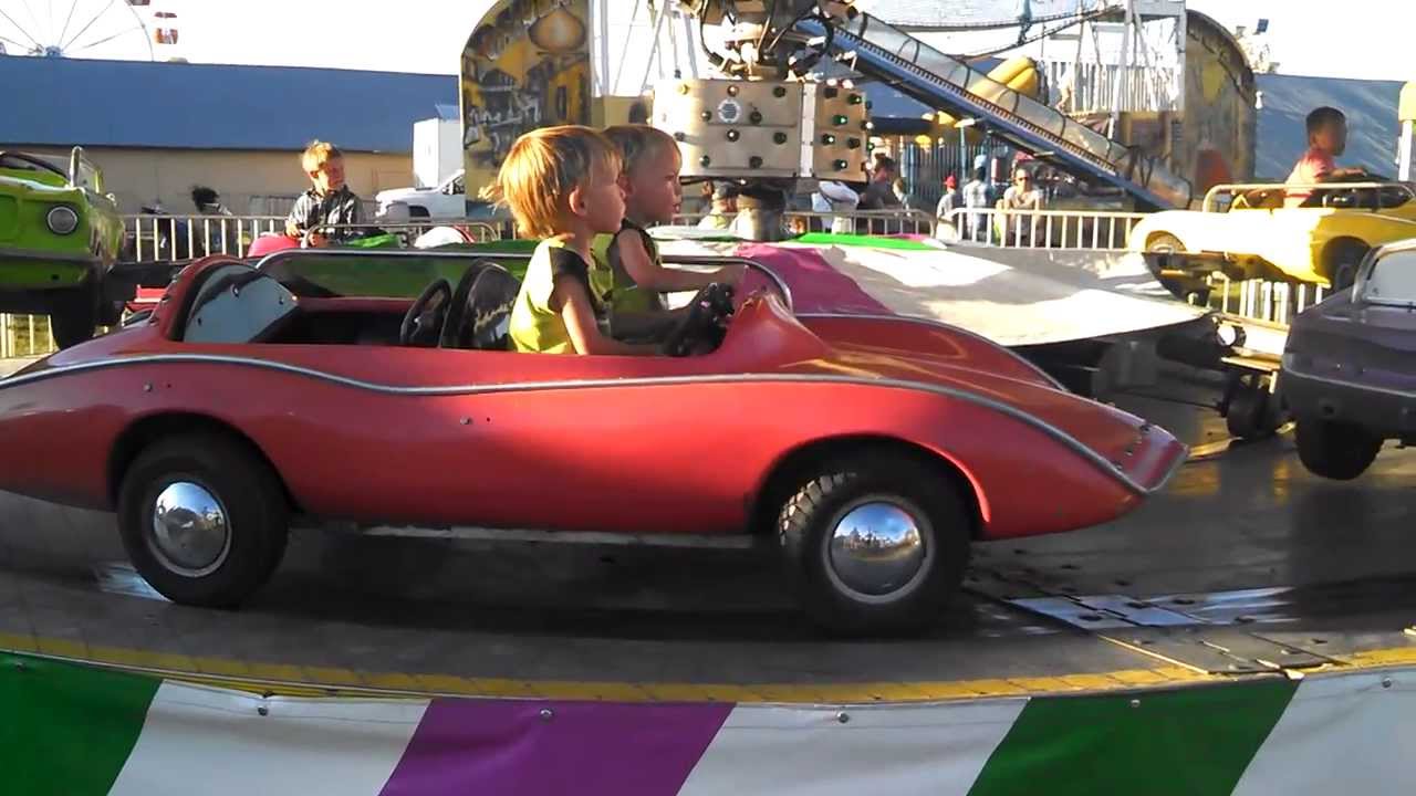 Boys first carnival ride - driving the cars - YouTube