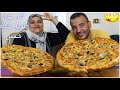 تحدي اكل 2 بيتزا عائليه الحجم الكبير جدا بعد يوم طويل وفي عز الشمس واللي حصل لنا حصل لنا العقاب كمان