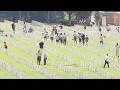 Volunteers place flags at West Tennessee Veterans Cemetery ahead of Memorial Day