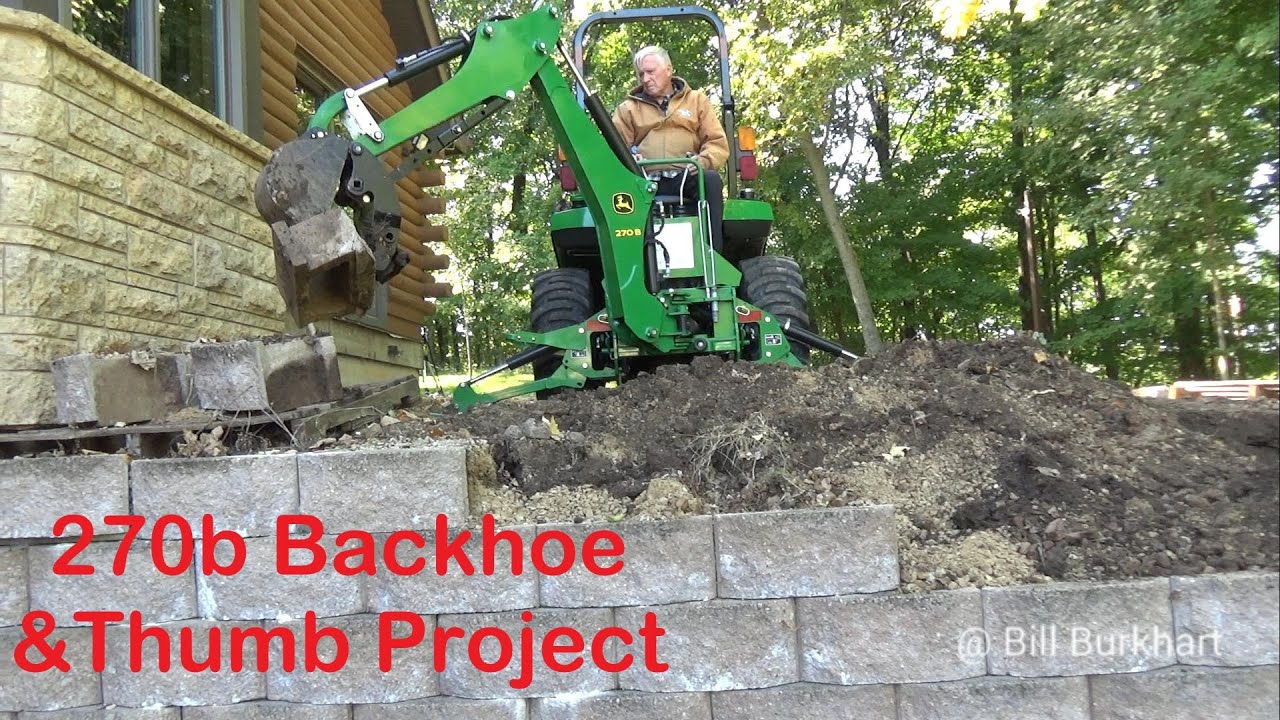 DIY retaining wall repair. Step by Step. John Deere 270b backhoe makes