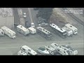 AERIALS Continued efforts to cool damaged S. California chemical tank venting toxic vapors