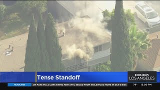 Suspect in custody after tense standoff in Compton