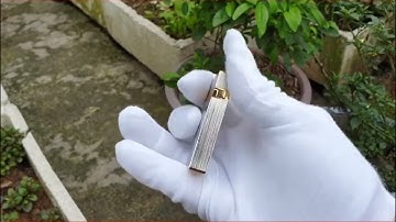 Bật lửa ST Dupont trắng xước viền vàng D132. Giá 2tr5 |Deva Shop