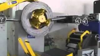 NC feeder machine with uncoiler and flattening operate .flv