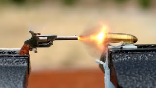 Can a 2 Inch Gun Fire a 1 Inch Bullet?  300,000FPS  The Slow Mo Guys