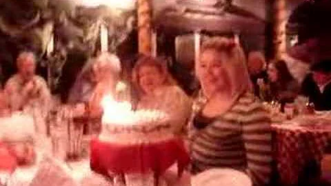 carlys birthday. singing while the cake comes