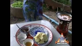 Thai Street Vendor Prepares Massaman Gai