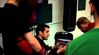 Coach feeding back to boxers after Accelerometer power output testing