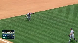 MIN@OAK: Plouffe barehands slow bouncer to get Canha