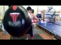 Jose osorio and raul lazo hitting the bag