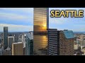 Beautiful Sunset Aerial Views over Seattle Skyscrapers & Puget Sound