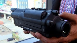 CNET News - High-tech rifle lets shooters hit a target 1000 yards away