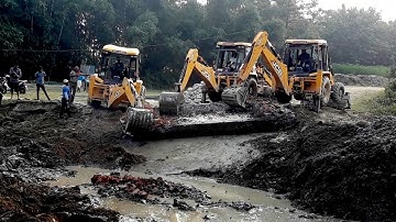 Three JCB Backhoe Machine Throwing Out Broken Bridge Concrete Slap/ Working Bridge Construction. P8