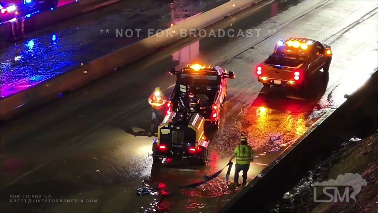 03-04-2026 Fort Worth, TX  - Construction crews use pumps to drain water for stranded vehicles