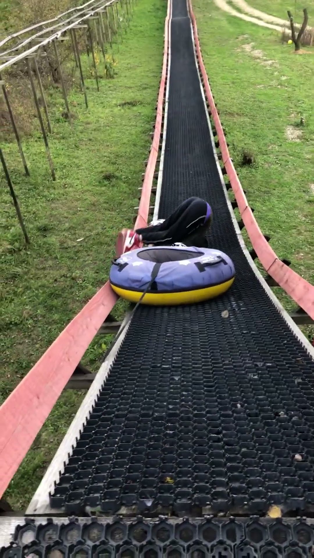 Girl Falls Off Slide After Tube's Cord Gets Stuck on Slide Rail