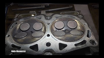 Subaru Timing Belt snapped, causing this damage