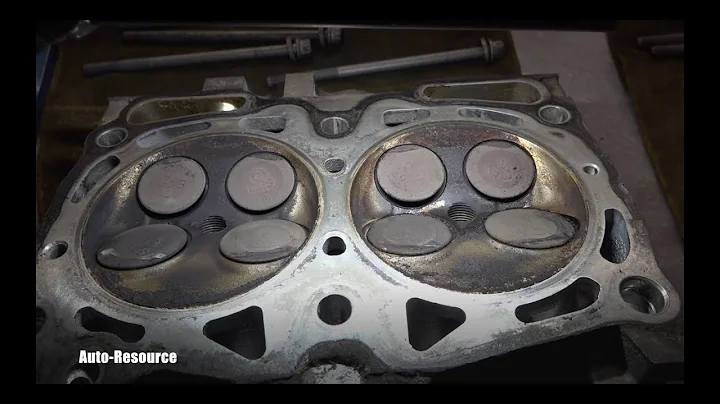 Subaru Timing Belt snapped, causing this damage