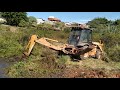 Limpeza lagoa com retroescavadeira case 580 M/ Backhoe case