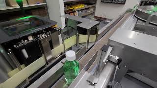 IQ-BTL Single Station Bottle Filling Machine filling 250ml bottles.