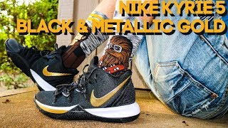 black and gold kyrie 5
