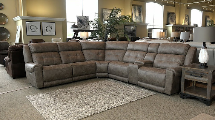 Power reclining sectional with power headrest and chaise