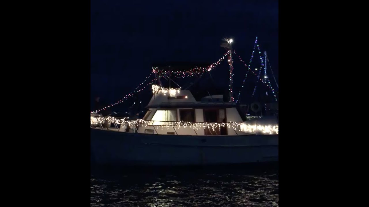 Festive boats from The Richmond County Yacht Club sail through Great