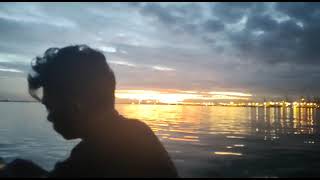 pemandangan sunset dari perahu