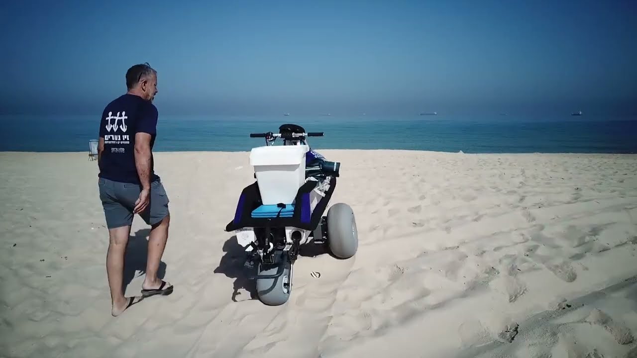 Torque Dolly Electric beach cart carrying a standup jet ski to the