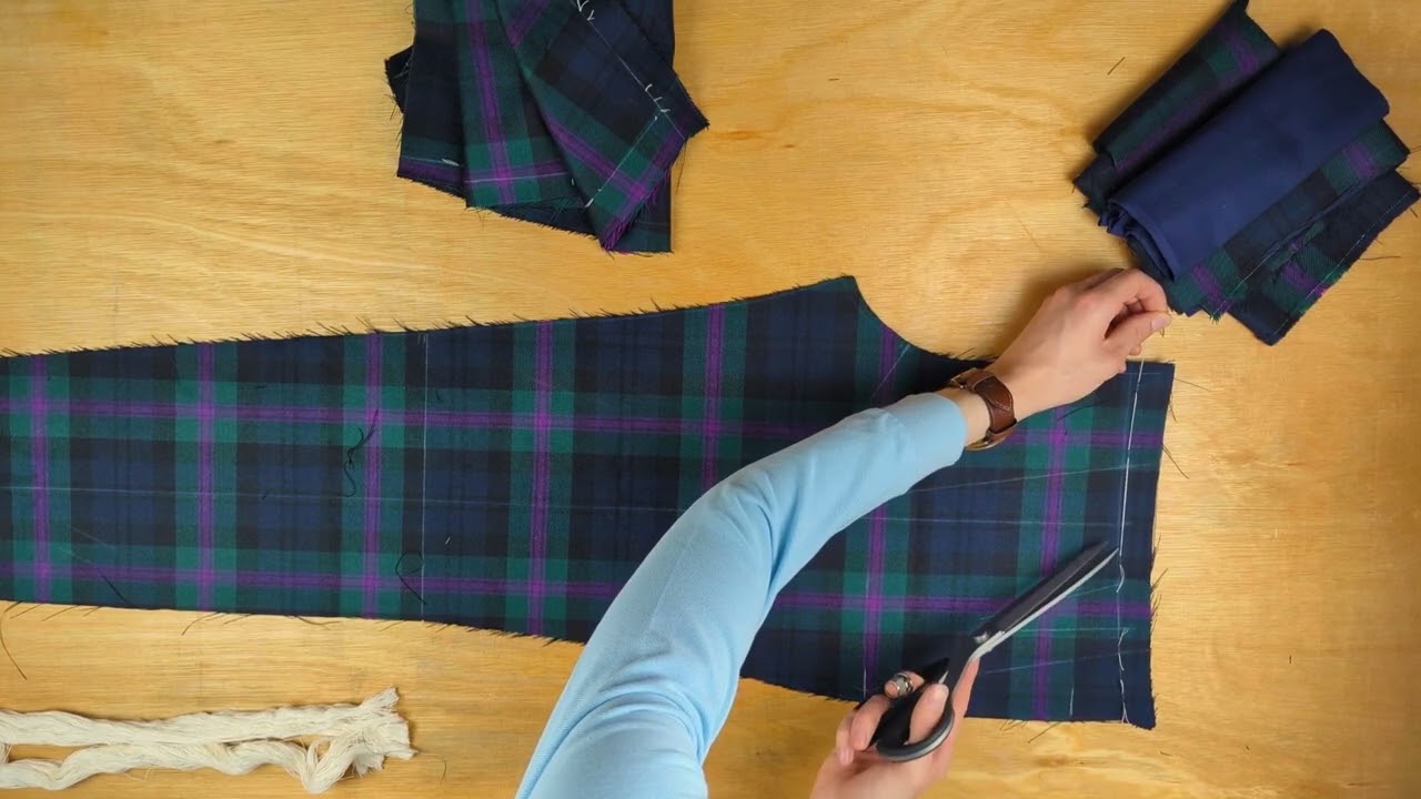 Mark stitching tartan trousers