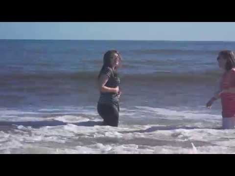 Amy and I jump into the waves at the beach a second time